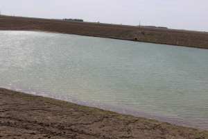 Larger pond used to store water pumped from the smaller pond